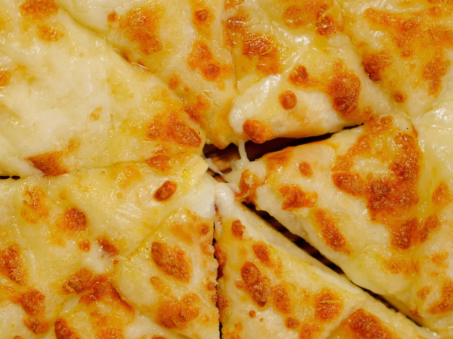 Cheese pizza with a simple melted-cheese topping.