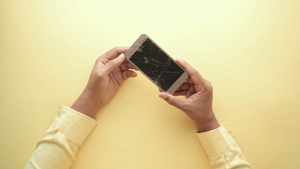 Person examining a damaged item that had been borrowed