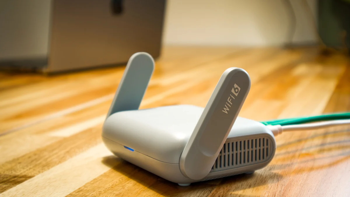 Modern Wi-Fi router on a wooden desk in a home setup
