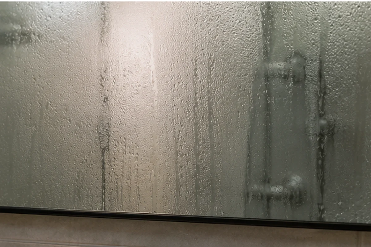 Fogged bathroom mirror after a hot shower