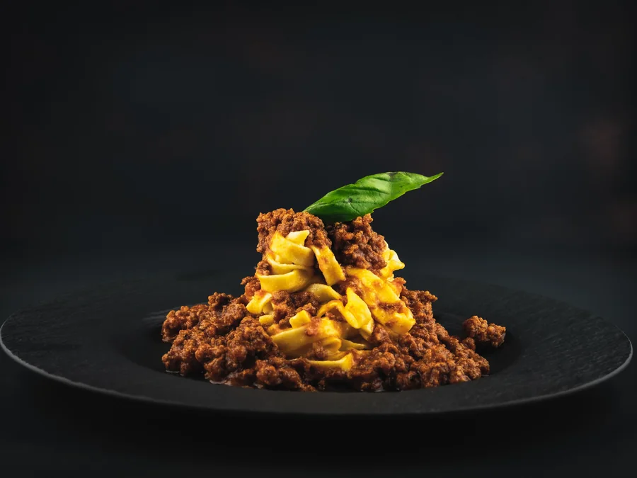 Spaghetti bolognese with meat and tomato sauce.