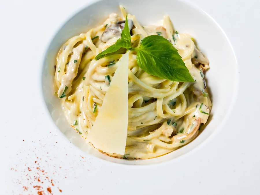 Creamy parmesan pasta with a simple sauce.