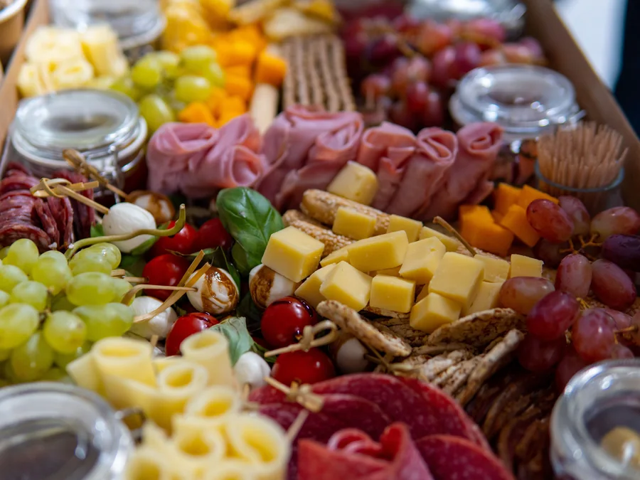 Cheese board with assorted cheeses.
