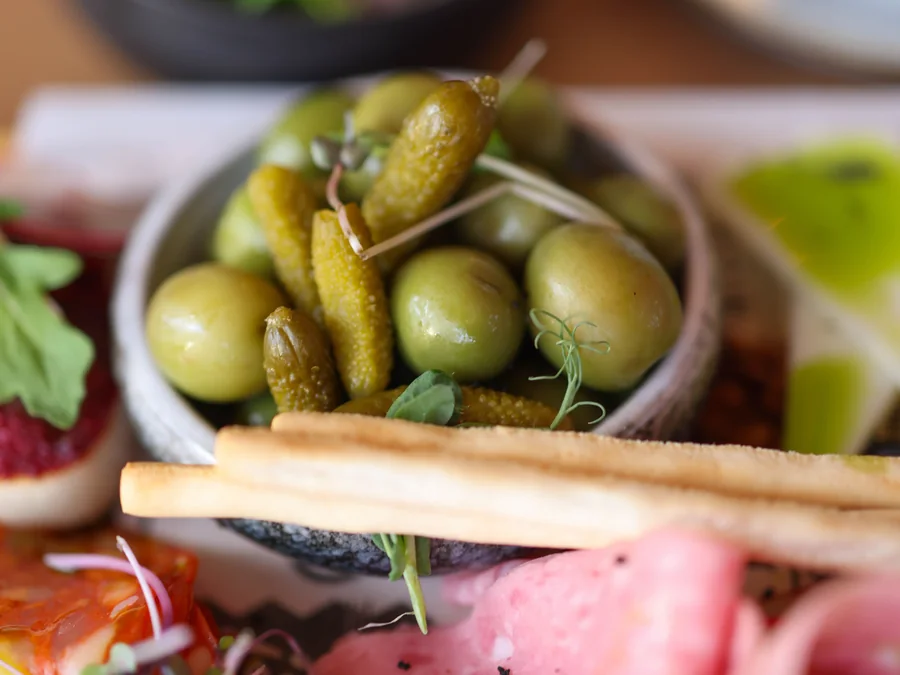 Olives and pickled vegetables served together.